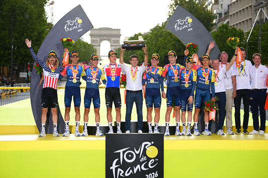 Lidl-Trek team on the podium in Paris at the 2026 Tour de France