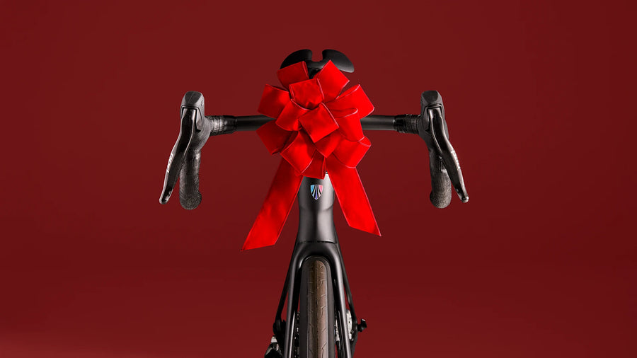 Road bike with a red bow on the handlebars